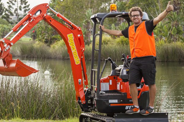 Guy on a Mini Excavator from Diggermate